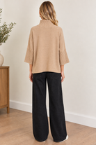 Aria Sweater Mocha by Rain & Rose with a mock neck and pleated sleeves, back view