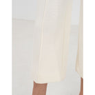 Close-up of Emily McCarthy Luna pants showing detailed embroidery on the stylish bottoms.