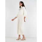 Emily McCarthy Luna Pants, cropped bottoms with side details, styled in a relaxed fit and neutral fabric for casual wear.
