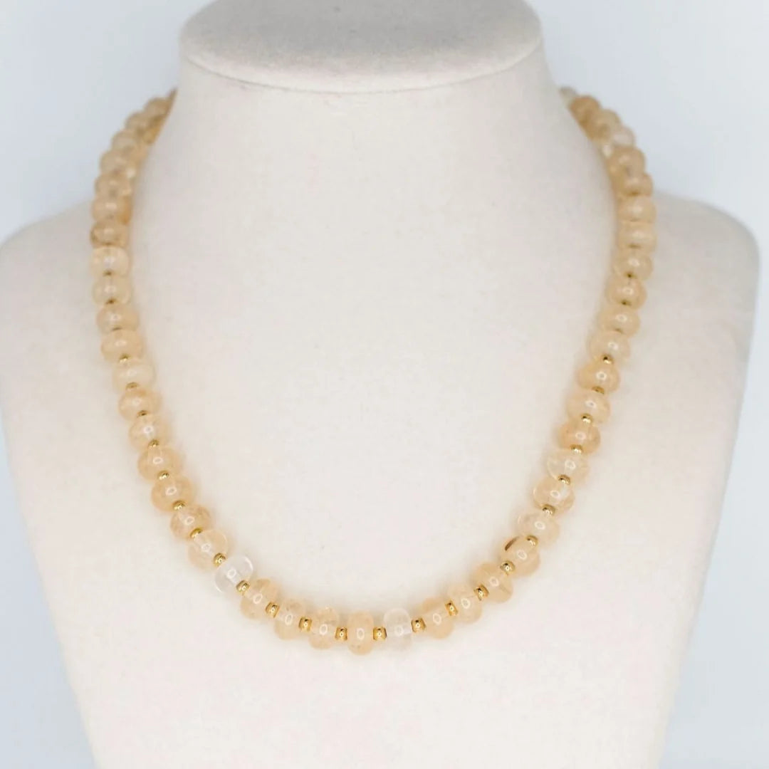 Sea Glass Necklace Coconut by Smith and Co. Design — coconut glass beads with gold spacers on bust form
