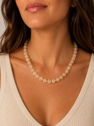 Sea Glass Necklace Coconut by Smith and Co. Design — coconut glass beads with gold spacers Style# GLASS CRM