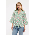 Smith & Quinn Bebe Top made of cotton featuring a botanical bloom pattern, with a relaxed fit and stylish design.