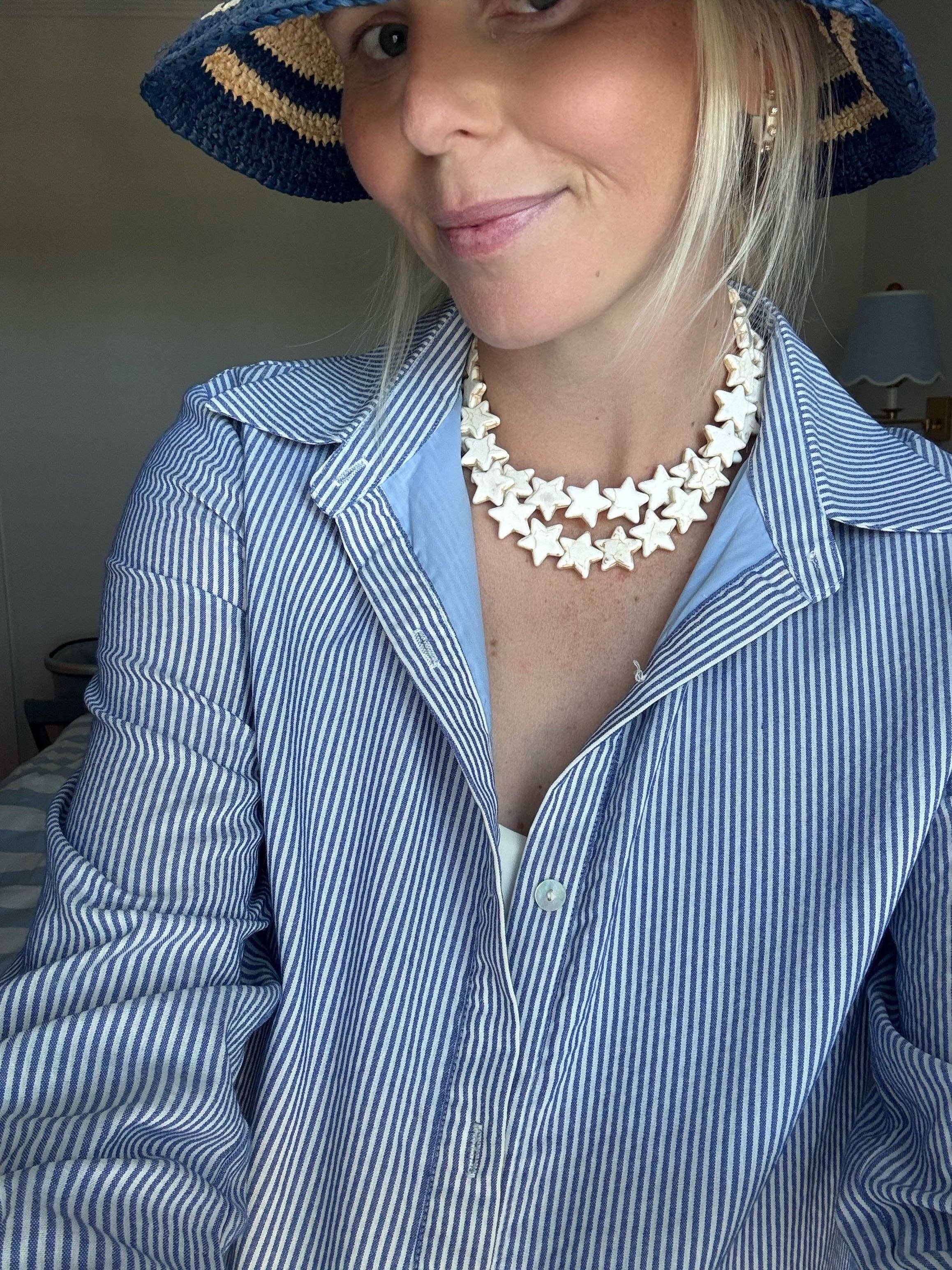 Star Necklace Large Coconut by Smith and Co. Design — coconut cream star bead necklace layered on model
