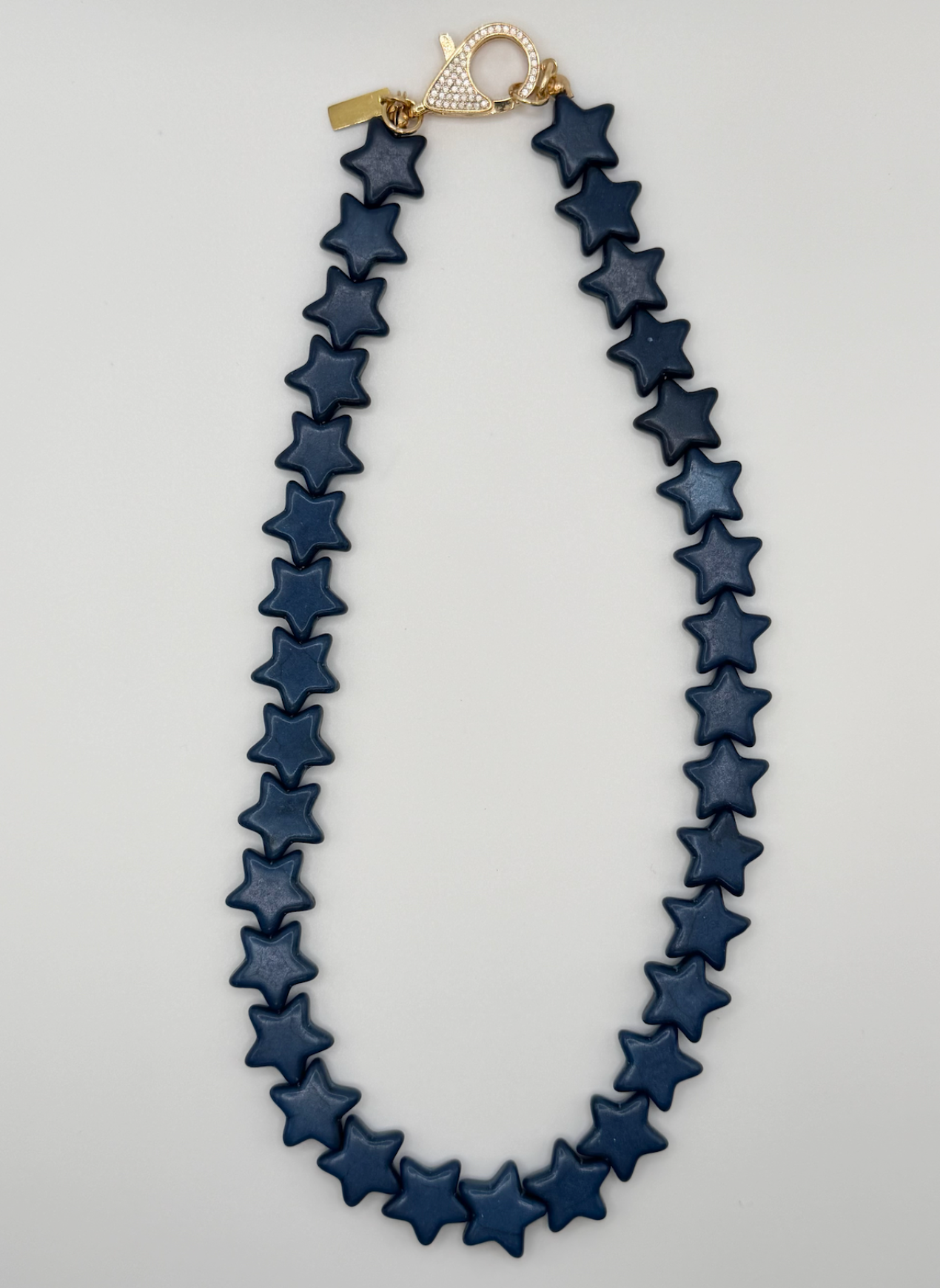 Star Necklace Small Navy by Smith and Co. Design — navy malachite star beads with gold lobster clasp