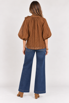  Back view of black Keely Top by THML showing keyhole closure and brown and khaki sleeve stripes, Style #WCT4031