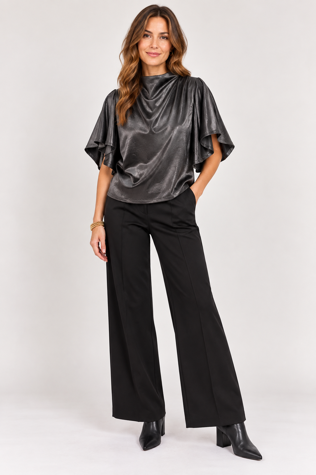 Front view of black Veronica Top with cowl neckline, pleated shoulders, and flowy sleeves, Style #WCT4008-1