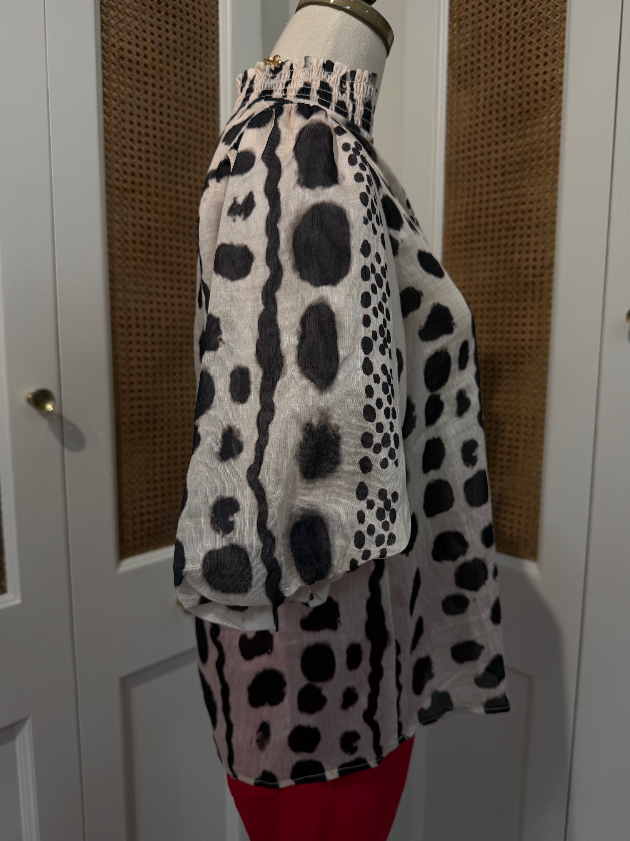 Julia Top by THML — black and white geometric print, smocked neckline, short puff sleeves, side view FTM3126-3