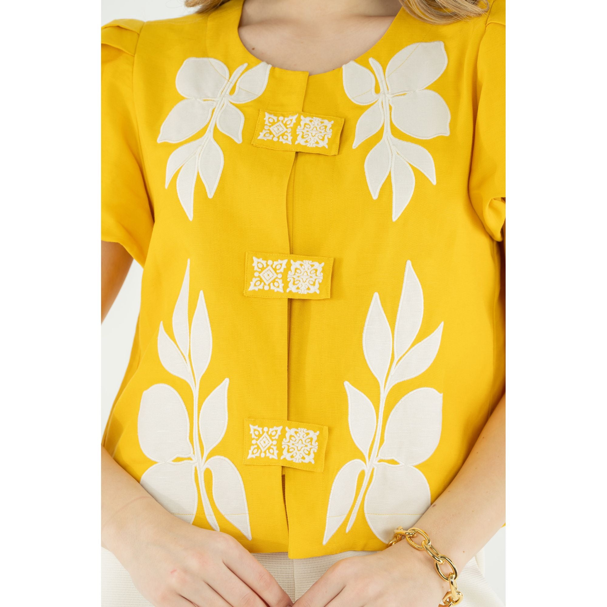 Emily McCarthy Isabella top, lightweight women's blouse with delicate details, showcasing soft fabric and stylish design.