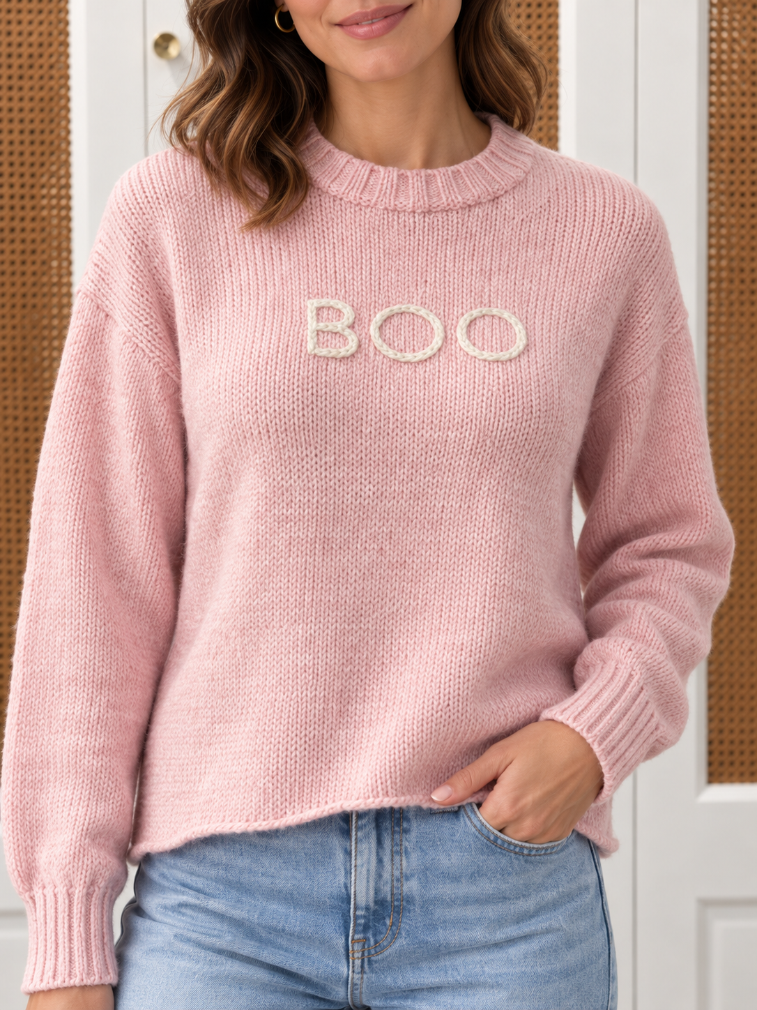 Wooden Ships Boo Sweater in arctic pink, style K57CPE3W693 — close-up of BOO embroidery on chest with ribbed crew neckline and cuffs