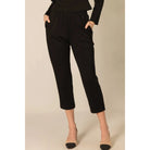 Black Patty Pants by P Cill featuring a comfortable butter modal fabric and ankle-length design.