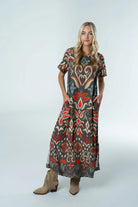 Front view of Diana Dress Ikat by Briton Court in charcoal, rust, turquoise, and neutral tones, Style #3925