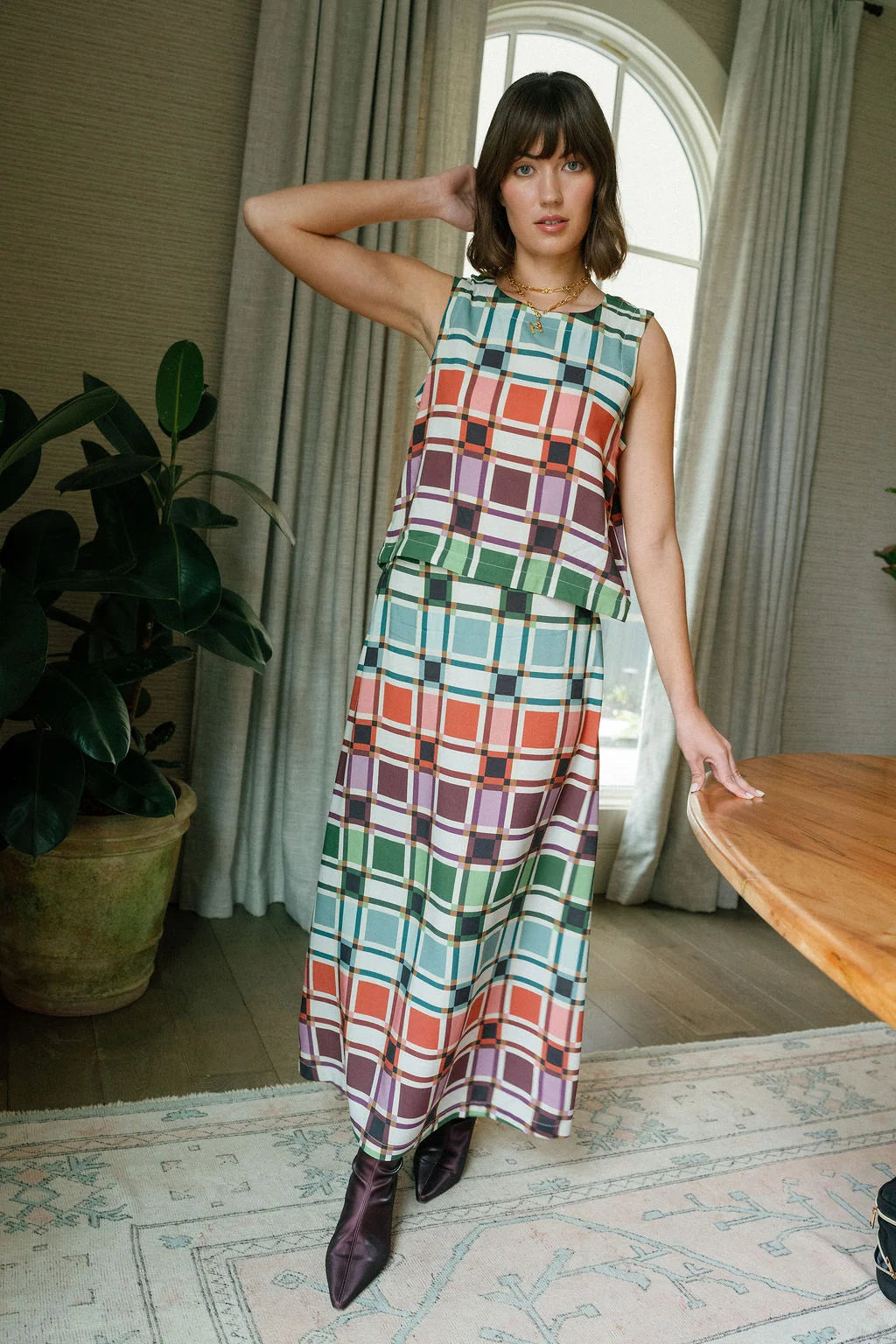 Front view of Tiffany Skirt by Briton Court in sage, coral, plum, and green Candy Box Check plaid, Style #3933