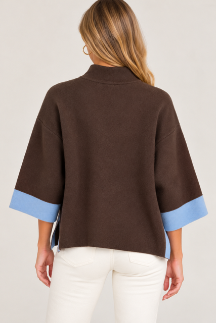 Barbara Sweater by Entro in brown with a mock neckline and light blue elbow-length cuffs, back view