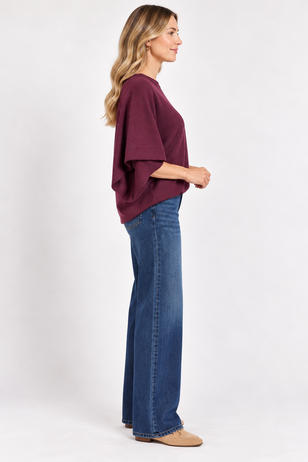 Eloise Top by Entro in merlot, side view showing round neckline, center seam, and wide draped sleeves. D31013