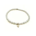erin-gray-rice-pearl-waterproof-bracelet-with-a-gold-filled-luxe-cross