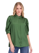 Callie Top by Jade in emerald green — puff sleeve button-front top with band collar and concealed placket, close-up front view
