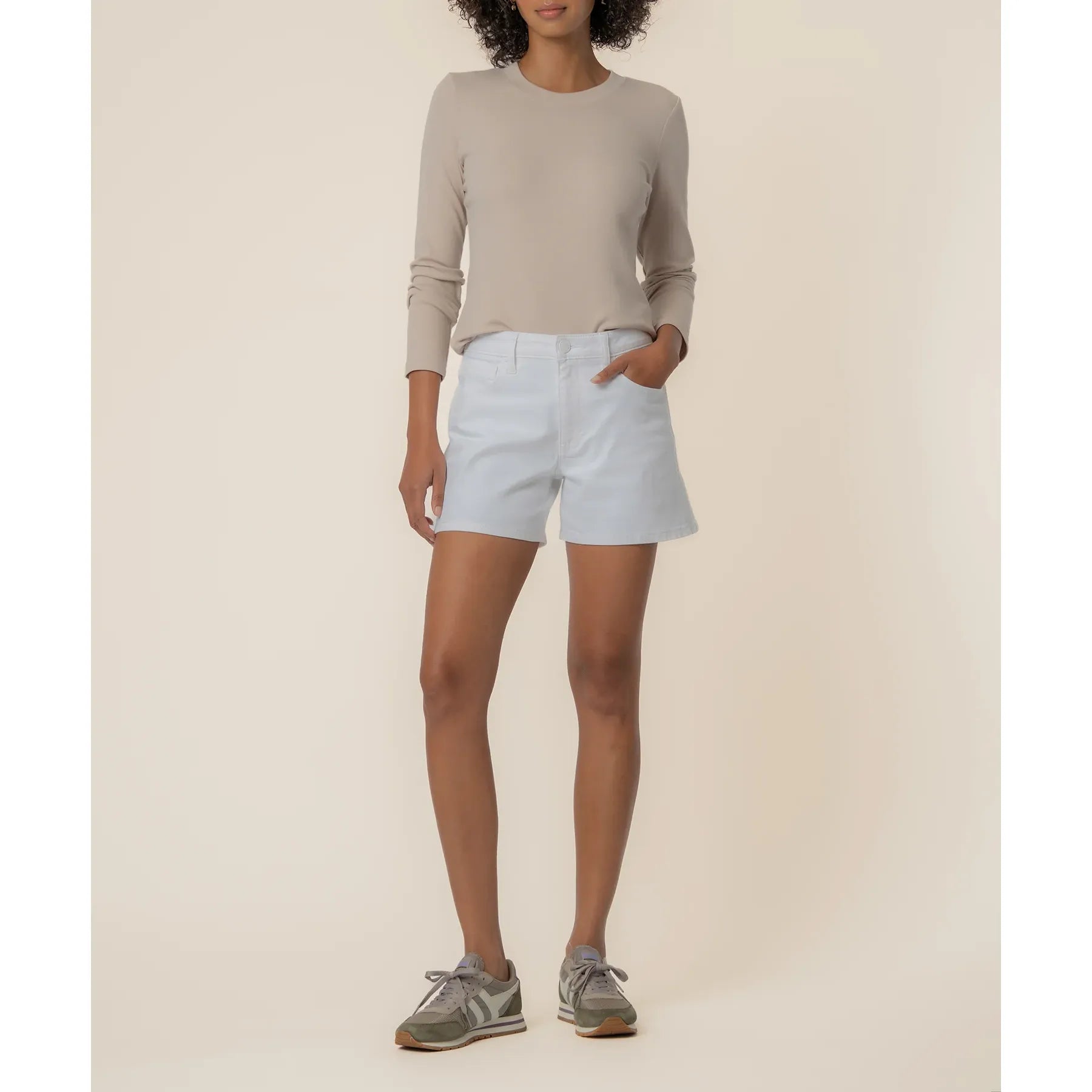 Jane high-rise jean shorts in optic white by Kut from the Kloth, shown on a model with a casual fit and distressed detailing.