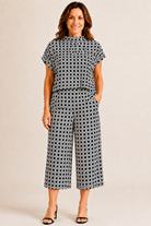 Lolly Pant by Jude Connally in Black Rattan print, front view, wide-leg cropped silhouette, elastic waistband, side pockets style # 201759
