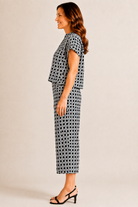 Lolly Pant by Jude Connally in Black Rattan print, side view, wide-leg cropped silhouette, elastic waistband, side pockets style # 201759