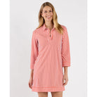 Jude Connelly Finley Dress in soft fabric with a flowing silhouette and subtle pattern, displayed on a hanger.