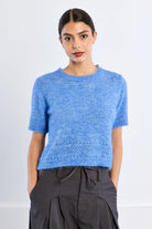 Ruth Top by Molly Bracken in Blue, front view, cropped boucle knit sweater, crew neckline, short sleeves with frayed edges, open pointelle hem trim, boxy silhouette Style# LAL705EN