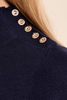 Mary Lou Top by Molly Bracken in Navy, zoom view, fitted ribbed knit mock turtleneck, elbow-length sleeves, gold button shoulder detail, slim silhouette Style# LA2012EN