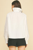 Anne Porter Top by Pinch white ruffled high-neck button-down, back view showing gathered collar and button cuffs
