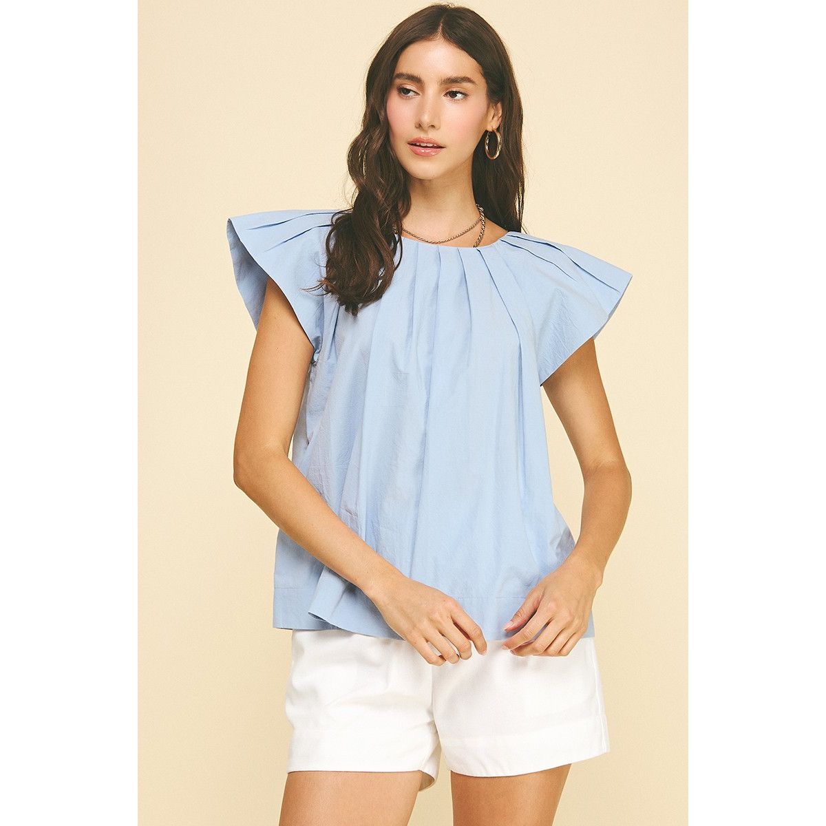 Pinch Angela Top in light blue with pleated shoulder details, stylish women's sleeveless blouse.