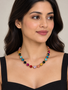 Rainbow Rhinestone Necklace by Marj & Lizzie, gold-tone strand of bezel-set multicolor stones
