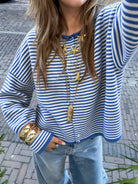 The Cora Beth Sweater by Rosa Clothing, blue and white striped knit cardigan with blue trim, front view