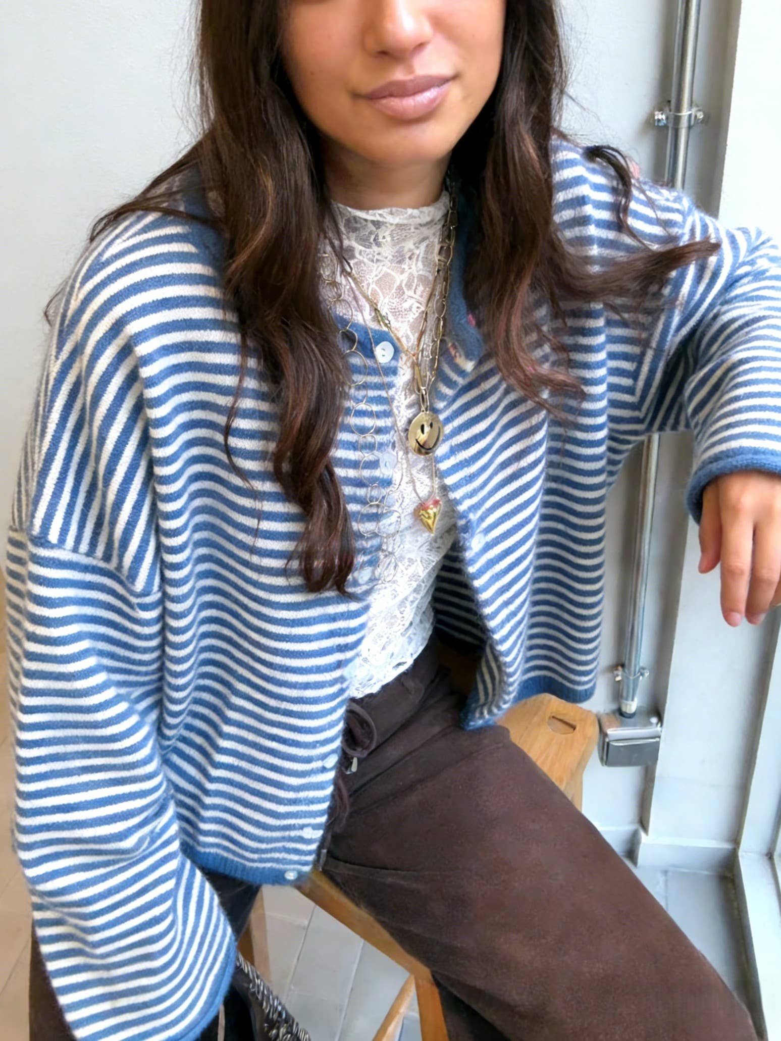 The Cora Beth Sweater by Rosa Clothing, blue and white striped knit cardigan with blue trim, front view2