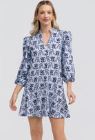 Hazel Dress by Smith & Quinn in Cornflower Parlour — powder blue navy floral mini dress with V-neckline and balloon sleeves, front view