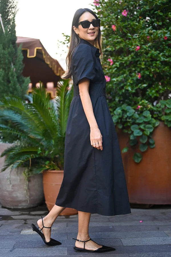 Axel Dress by Wyatt Wylde - black cotton maxi dress with short sleeves and fitted waist, side view